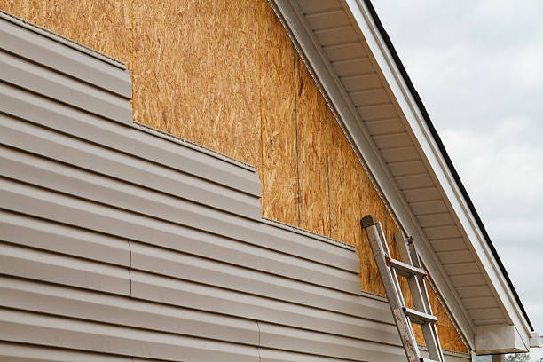 Professional Siding Installation technician working in Norfolk, VA